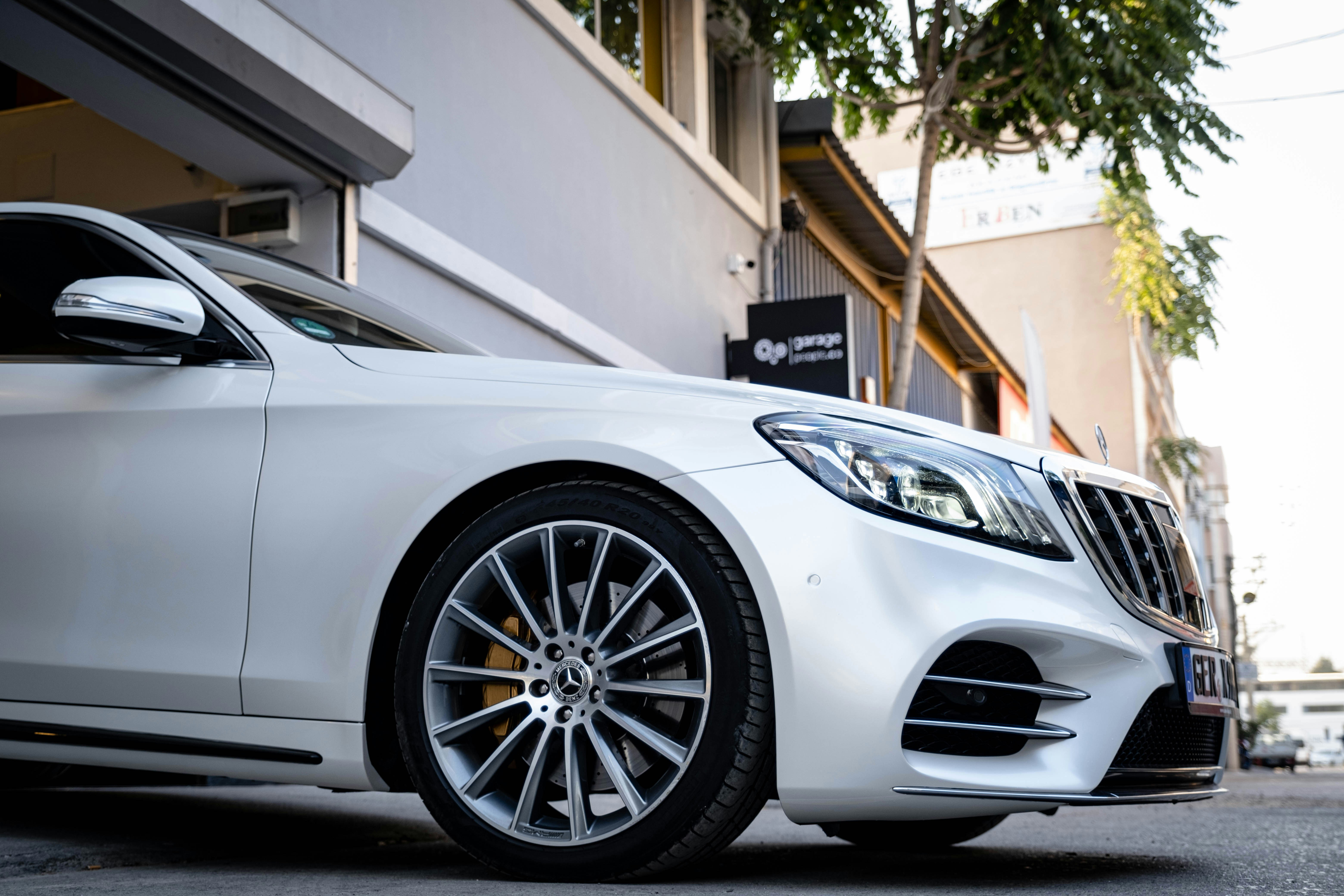 woman wearing yellow long-sleeved dress under white clouds and blue sky during daytime