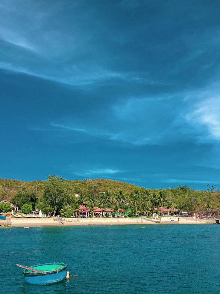Traditional wooden boats navigating tropical islands