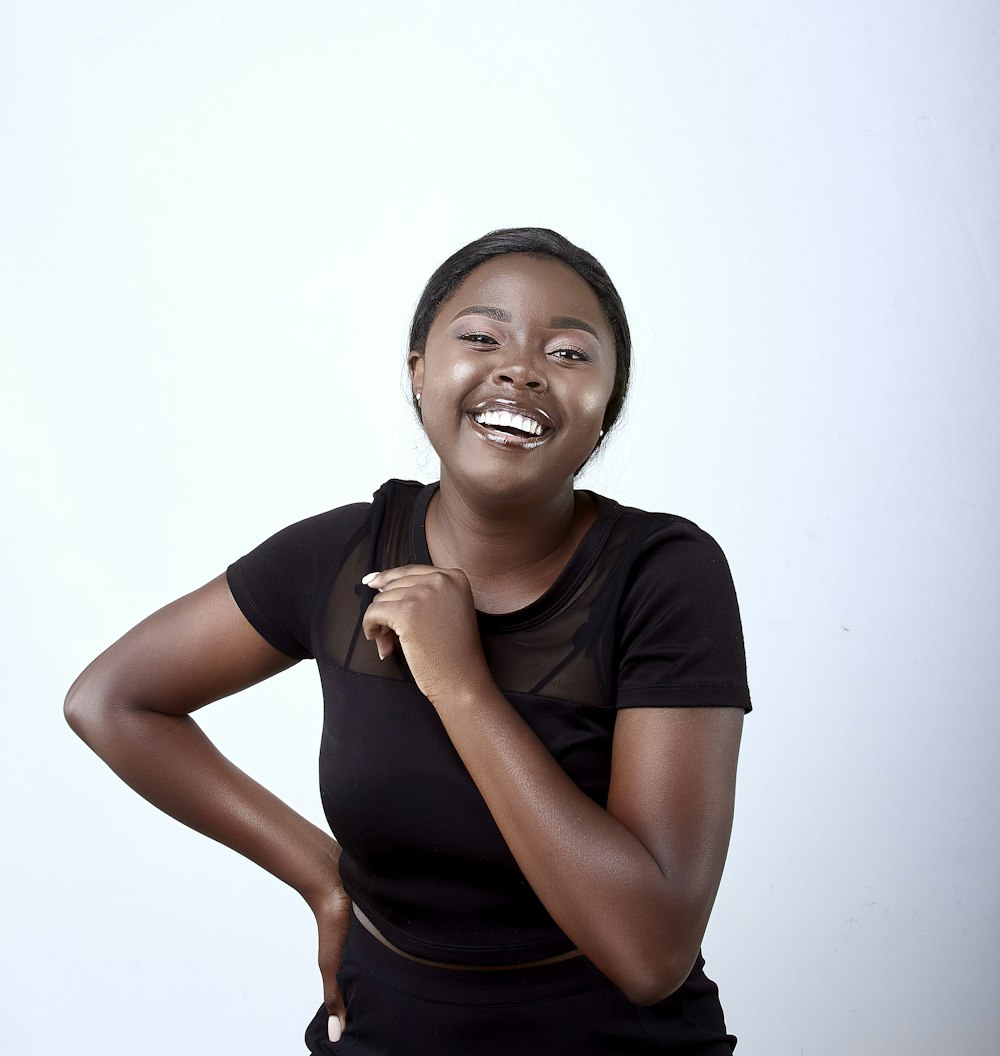 a woman with a toothbrush in her mouth