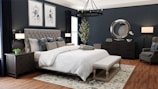 a bedroom with blue walls and a large bed