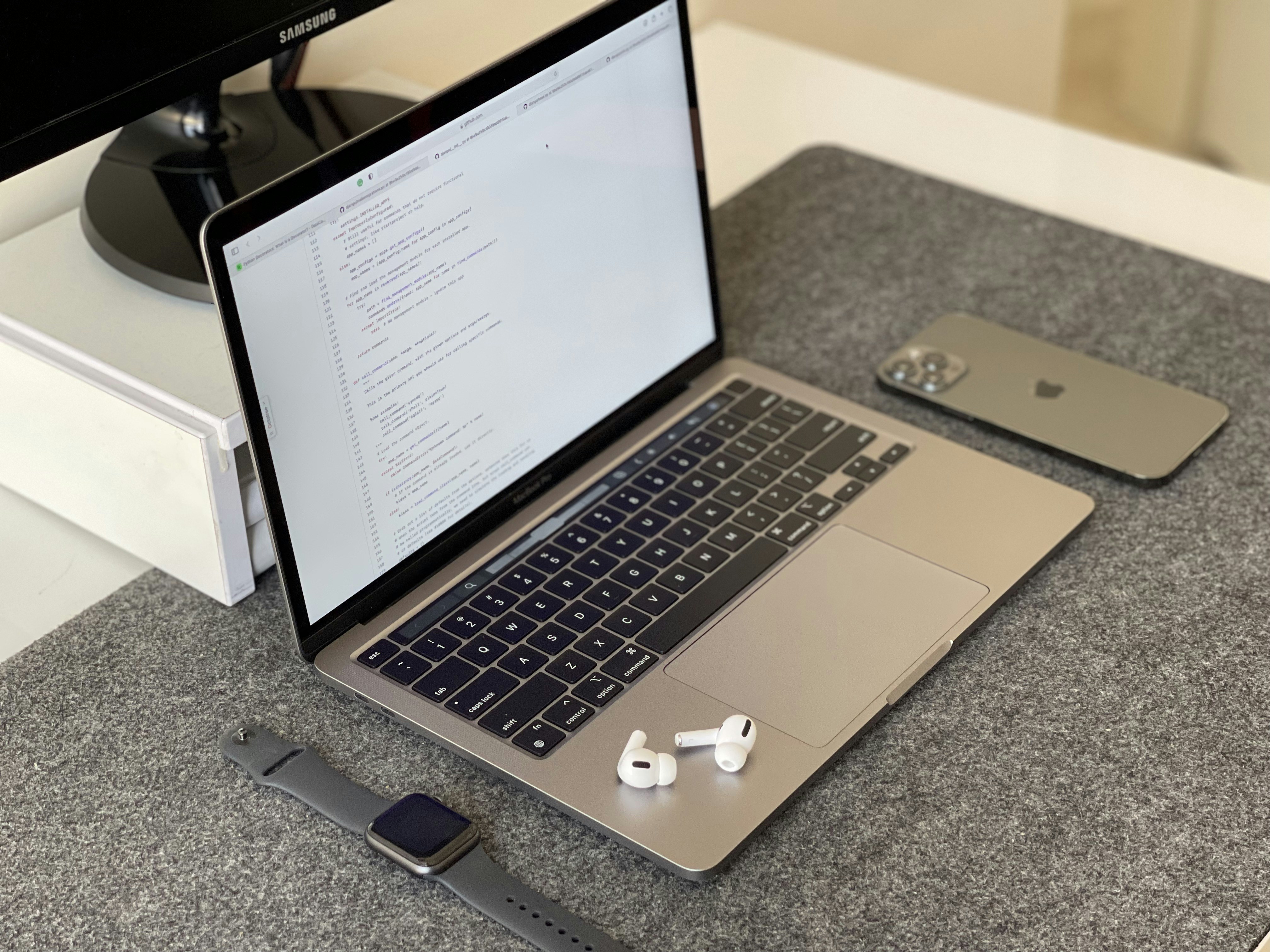 an open laptop computer sitting on top of a desk
