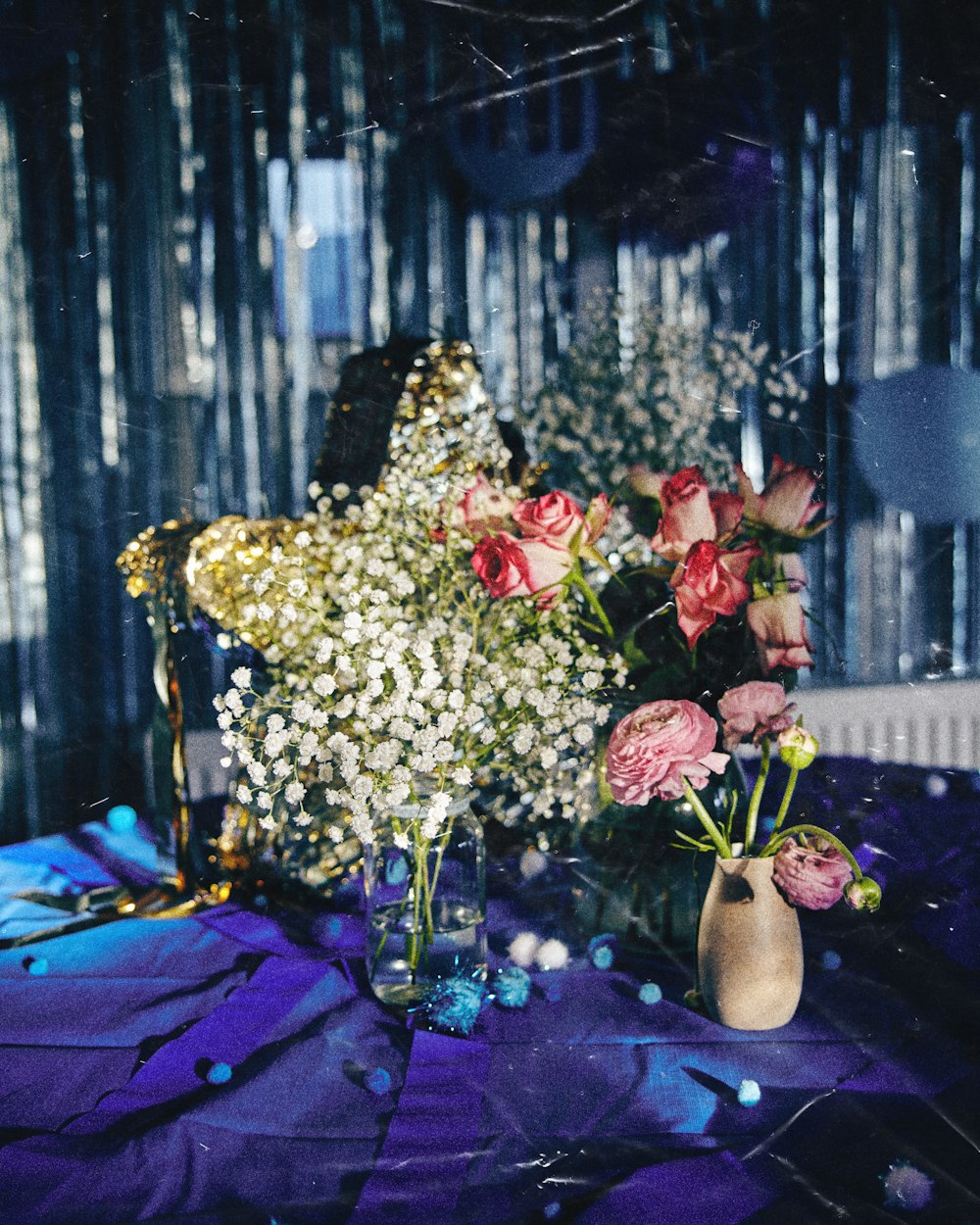 a vase of flowers sitting on a table
