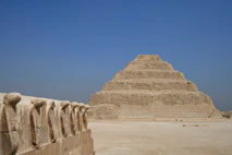 a very tall pyramid sitting in the middle of a desert