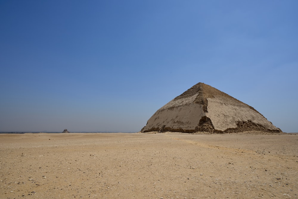 a large pyramid in the middle of a desert