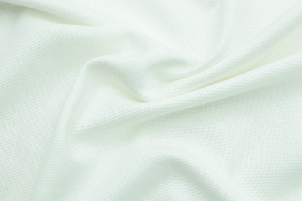 a close up view of a white fabric