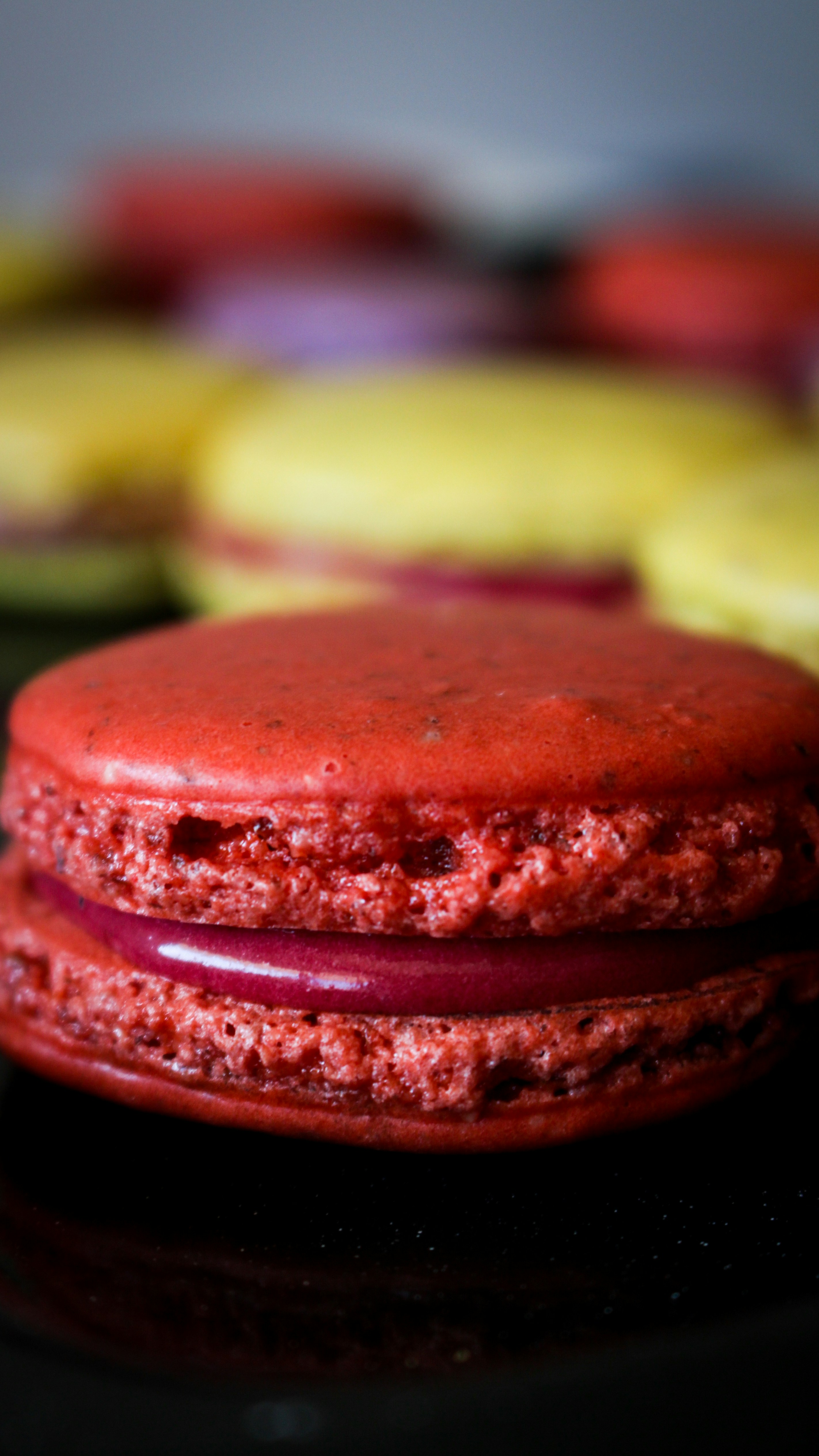 Macaron cross-section showing ganache filling and chewy interior