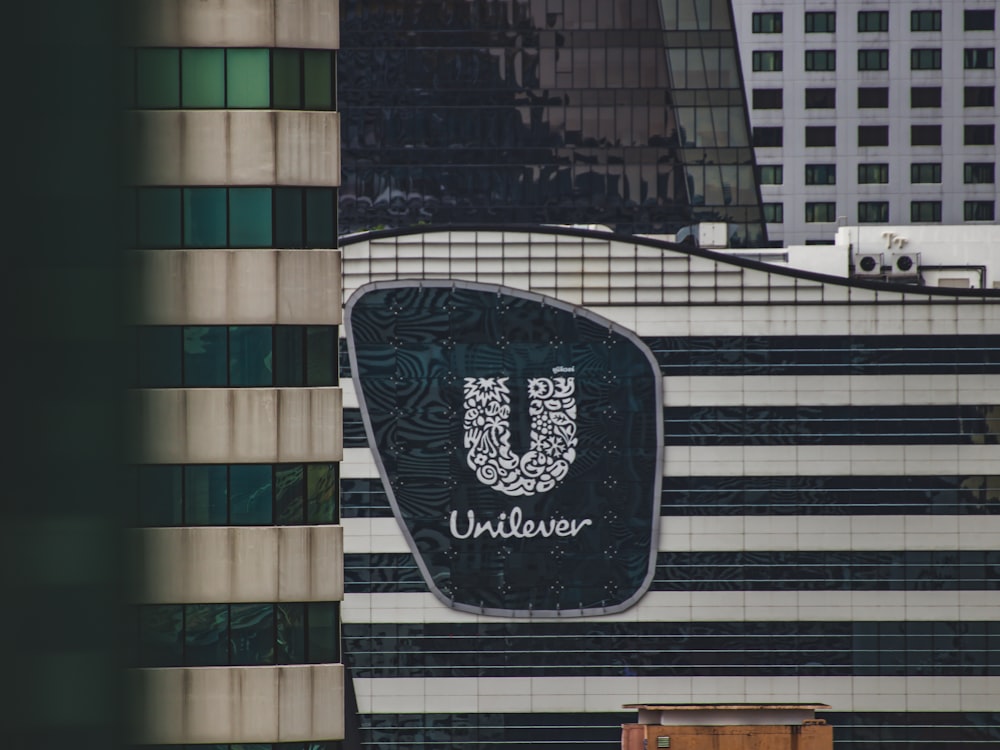 a large building with a large u sign on it's side