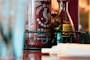 a close up of a bottle of liquor on a table