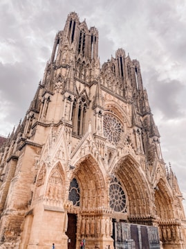a large cathedral with a clock on the front of it