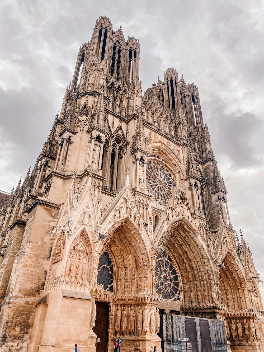 a large cathedral with a clock on the front of it