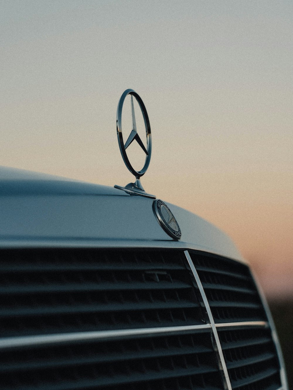 a mercedes emblem on the hood of a car