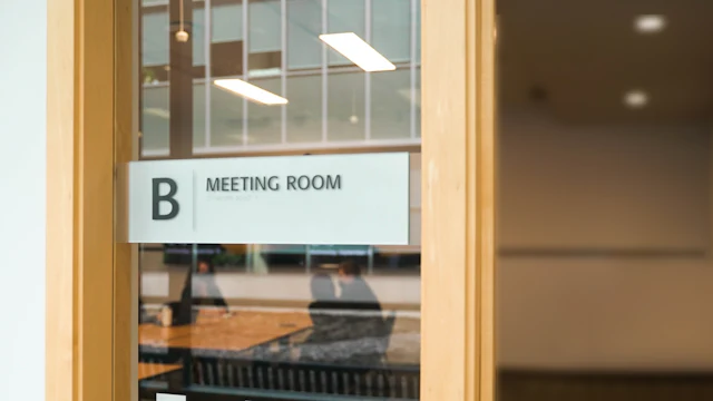 Signed Glass Meeting Room — commercial glass partition interior design