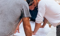 a group of men working on a project