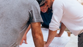 a group of men working on a project