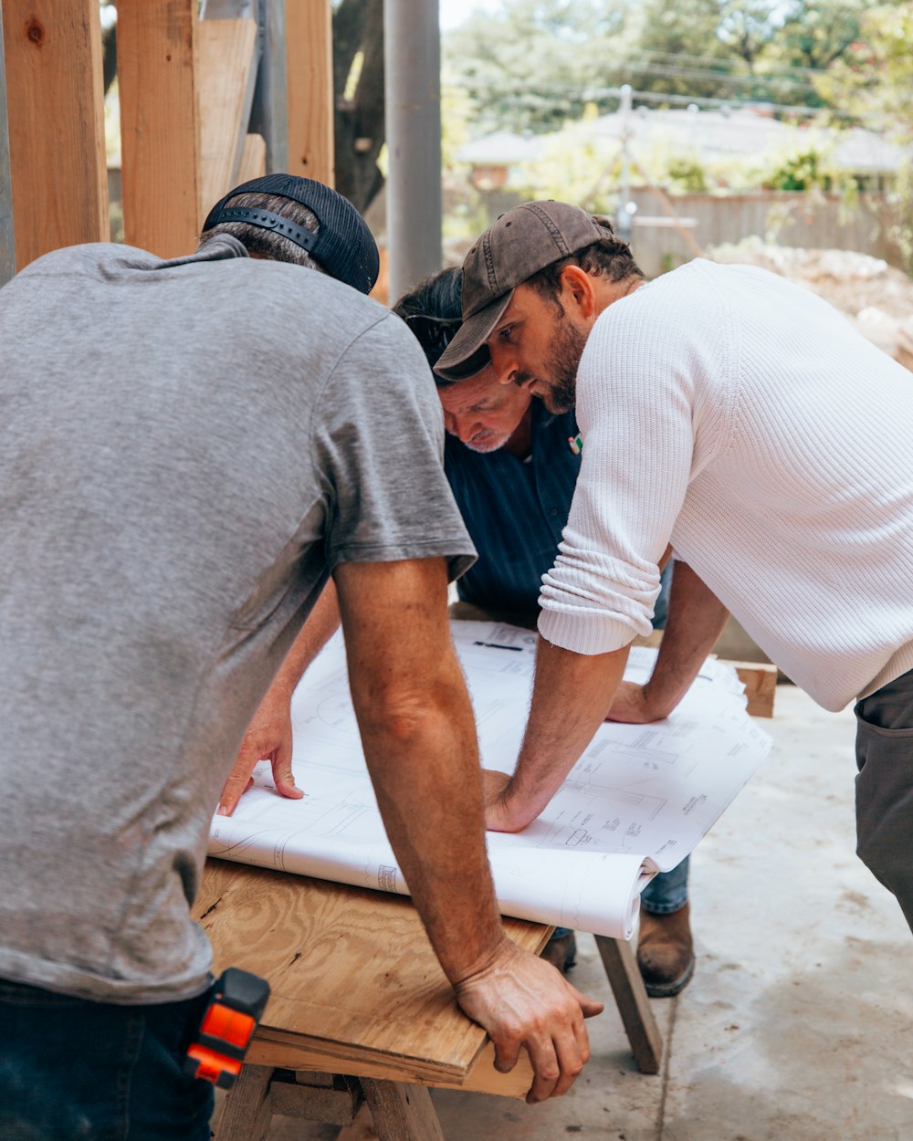 a group of men working on a project