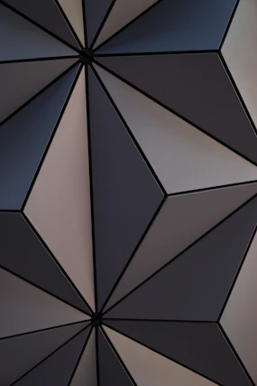 a close up of a black and white wall