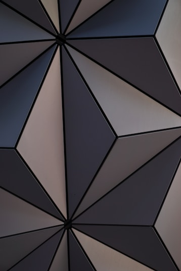 a close up of a black and white wall