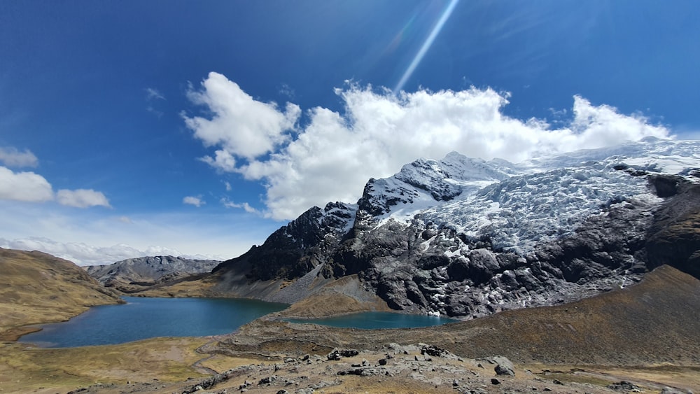 a mountain with a lake in the middle of it