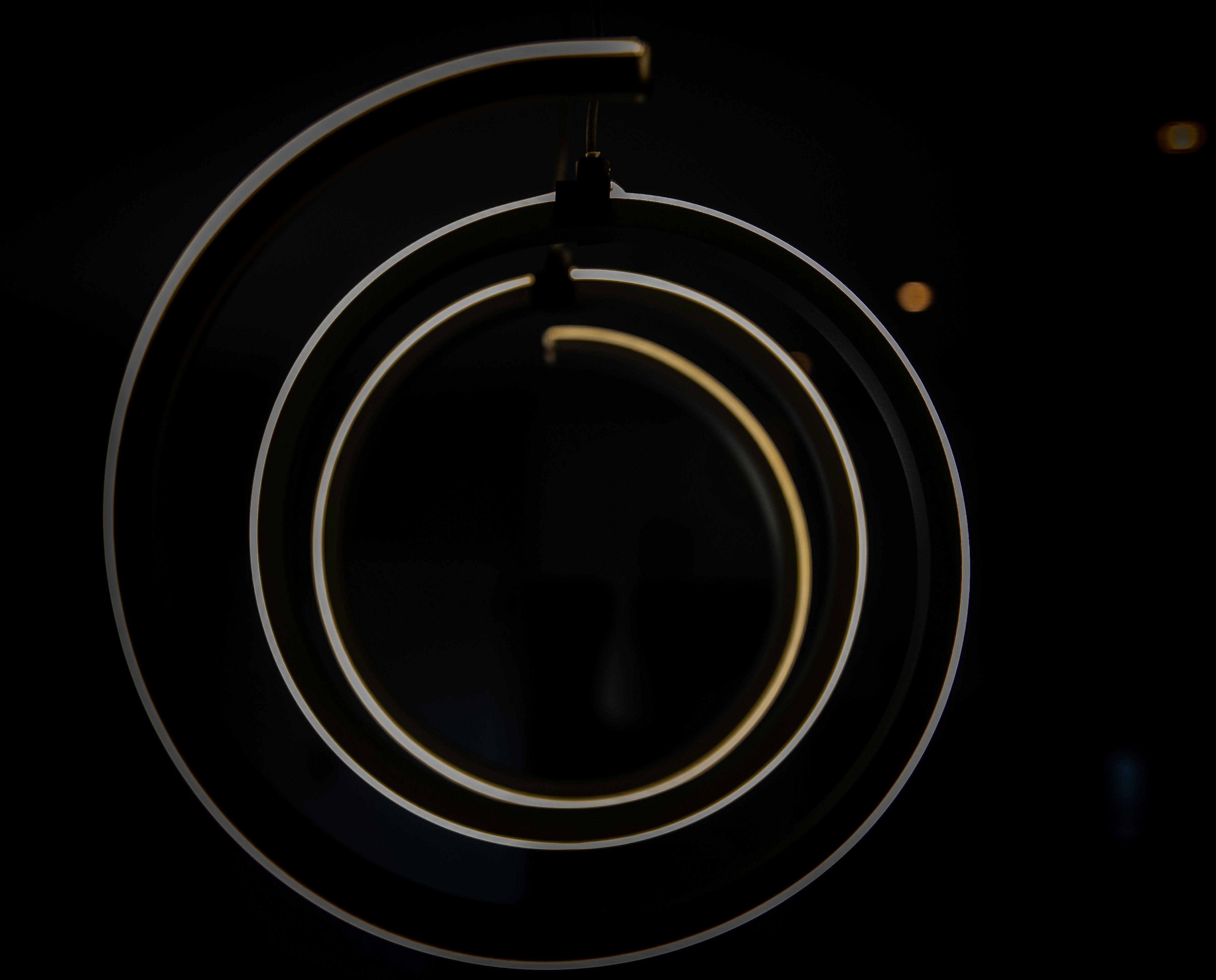 a close up of a circular object in the dark