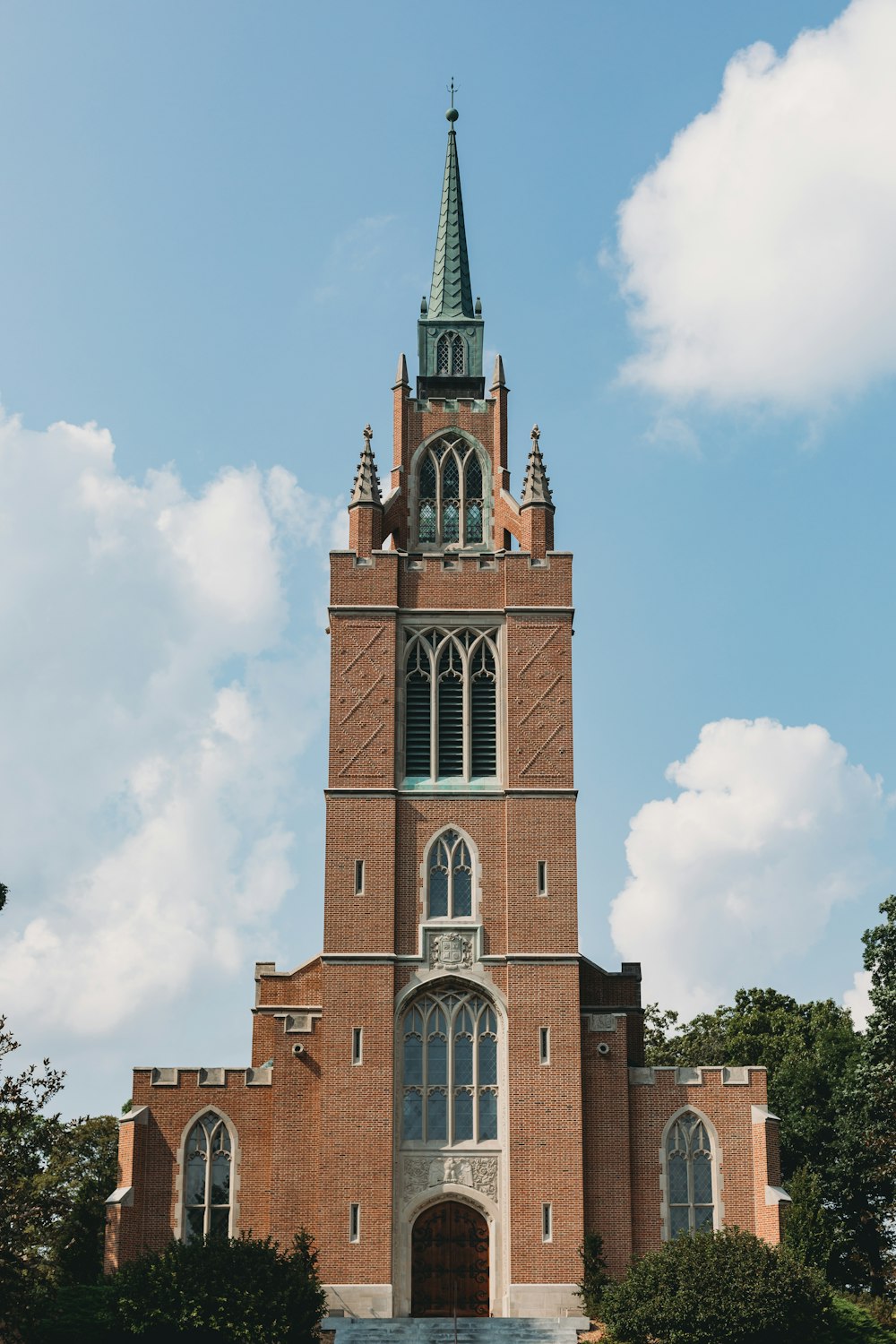 a tall brick building with a clock tower