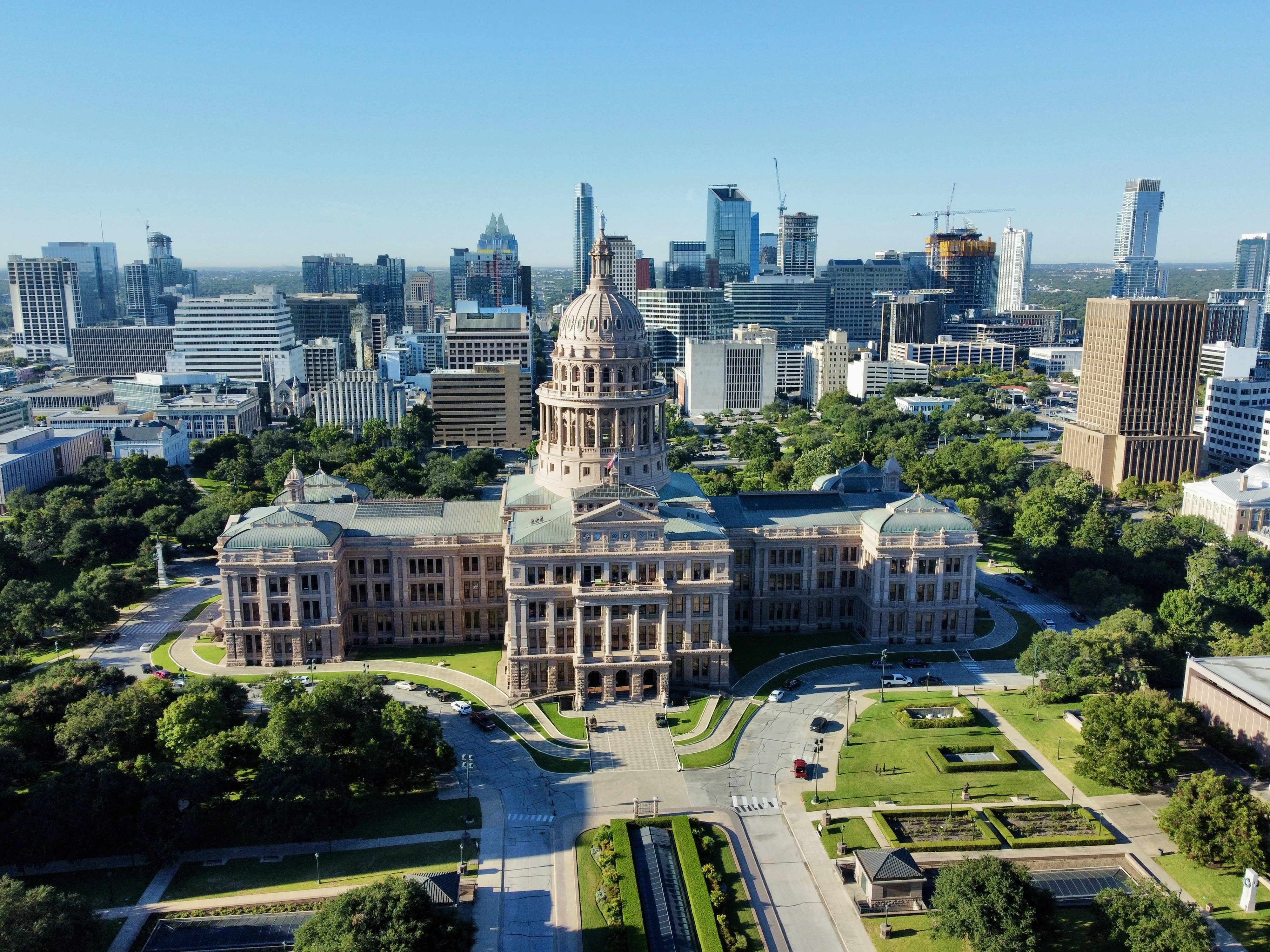 an aerial view of a large building in a city