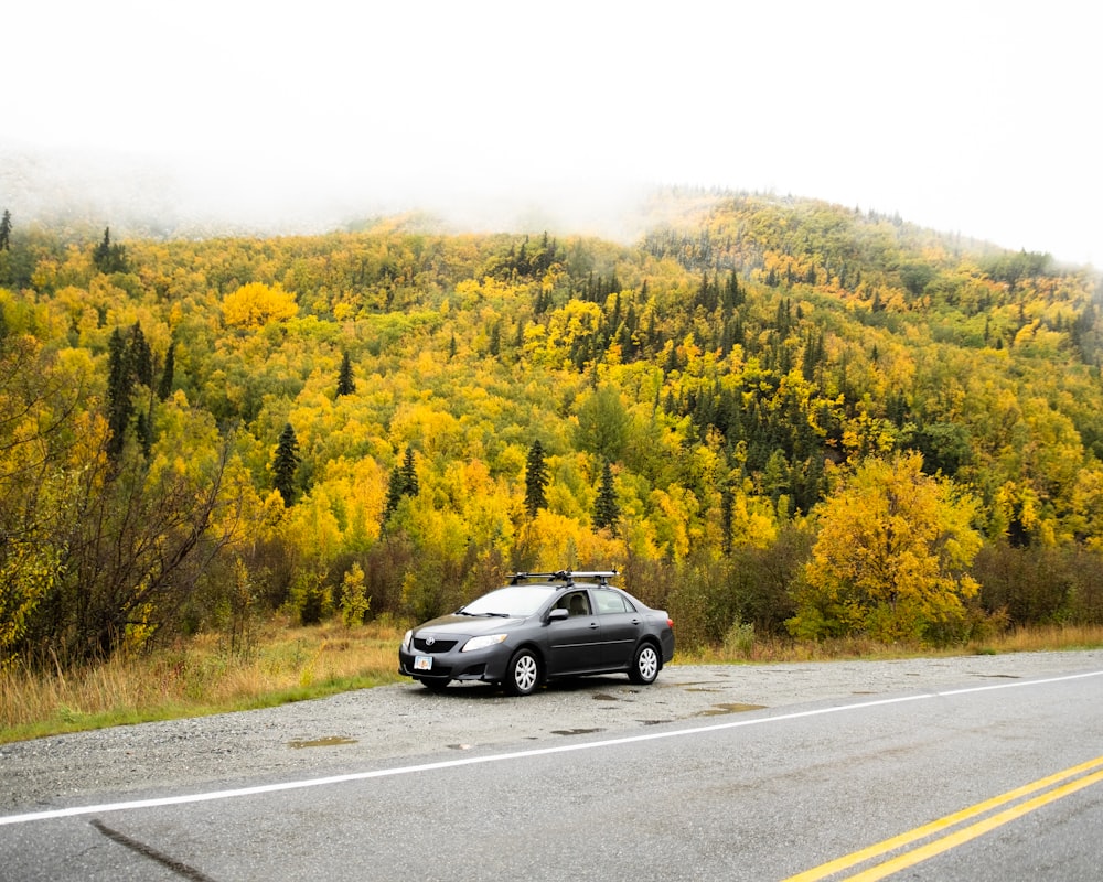 a car is parked on the side of the road