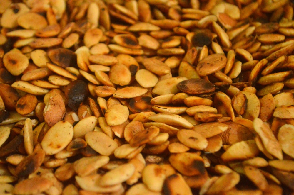 a close up of a pile of nuts
