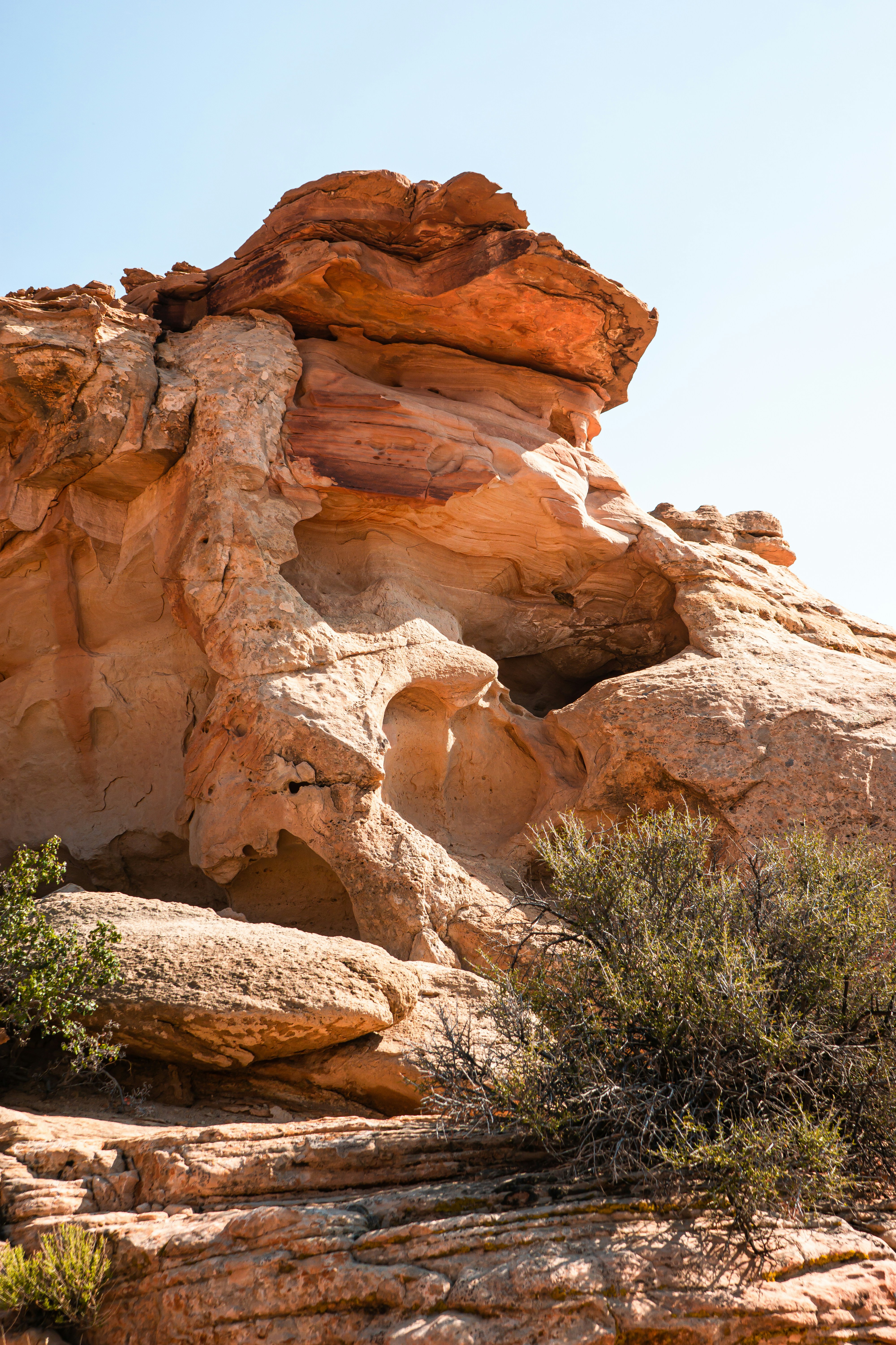 a rock formation in the middle of a desert