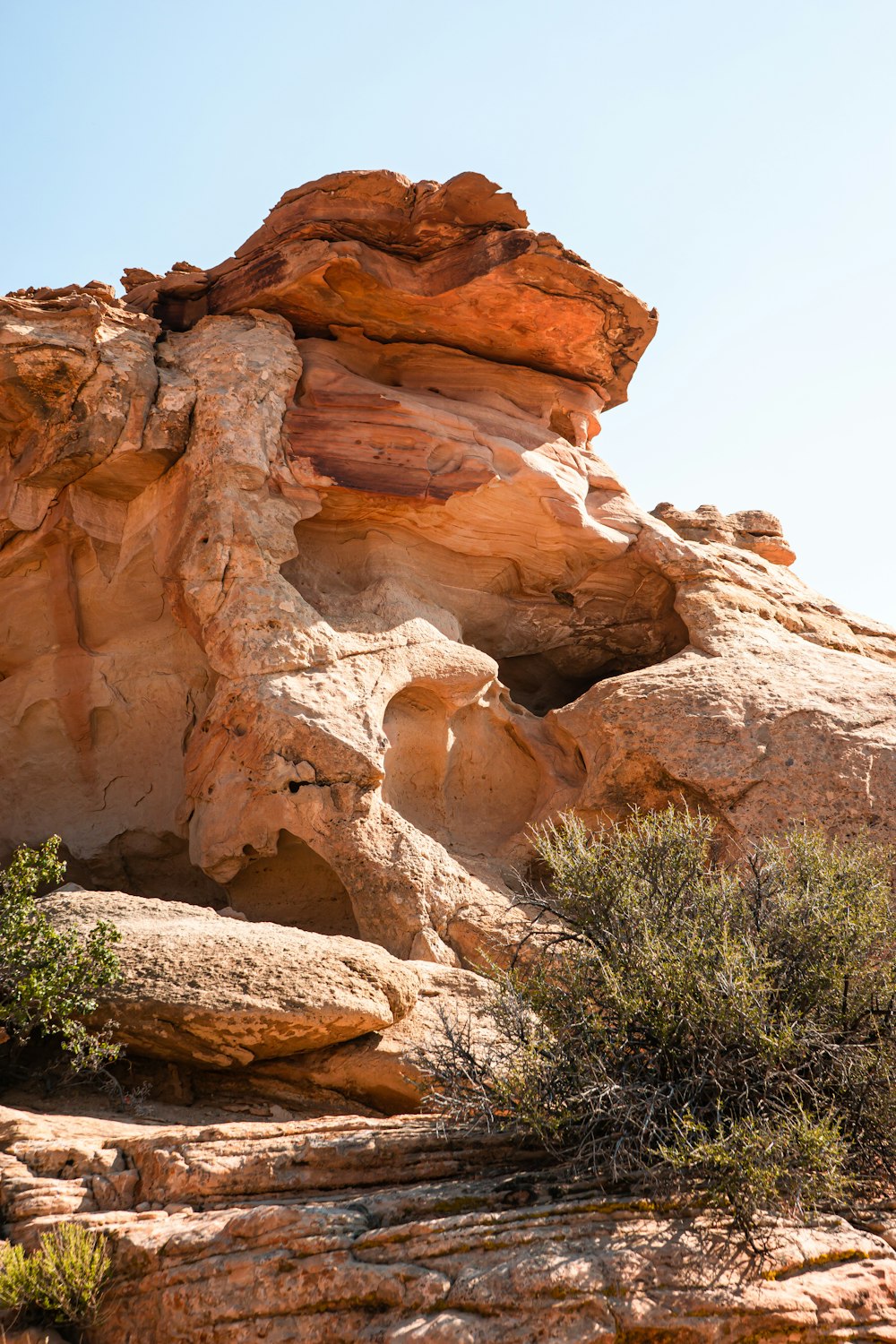 a rock formation in the middle of a desert