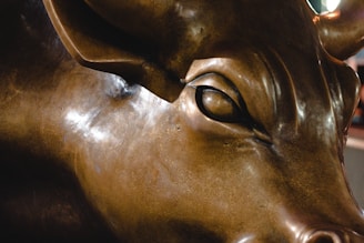 a close up of a statue of a bull
