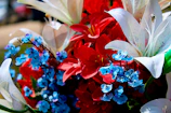 A modern flower board design with bold blue accents and fresh white lilies.