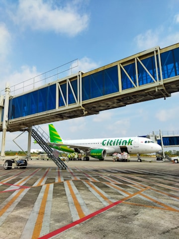 a large jetliner sitting on top of an airport tarmac