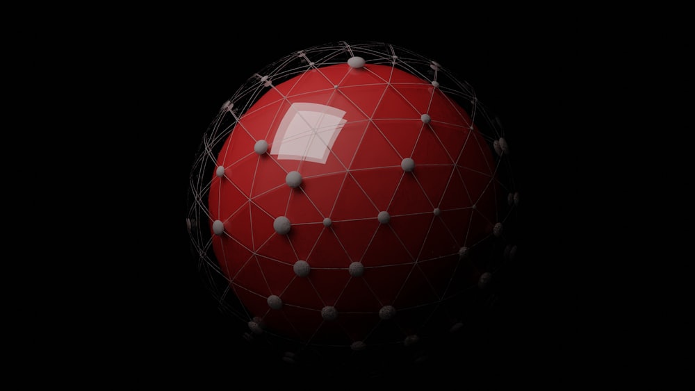 a red ball with white dots on it