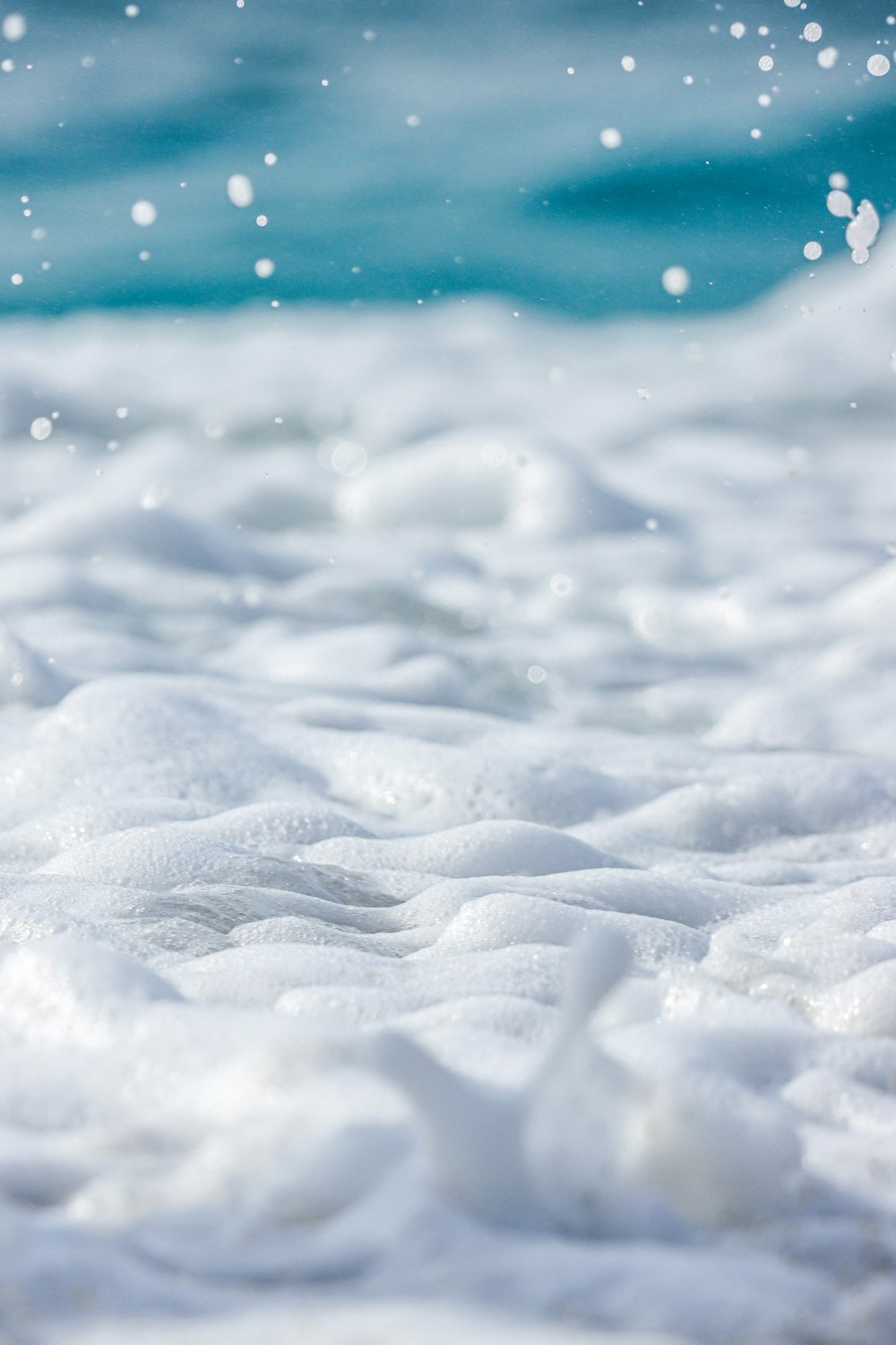 a close up view of the ocean waves