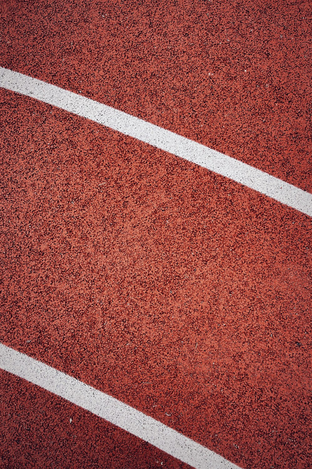 a tennis court with a white line on it