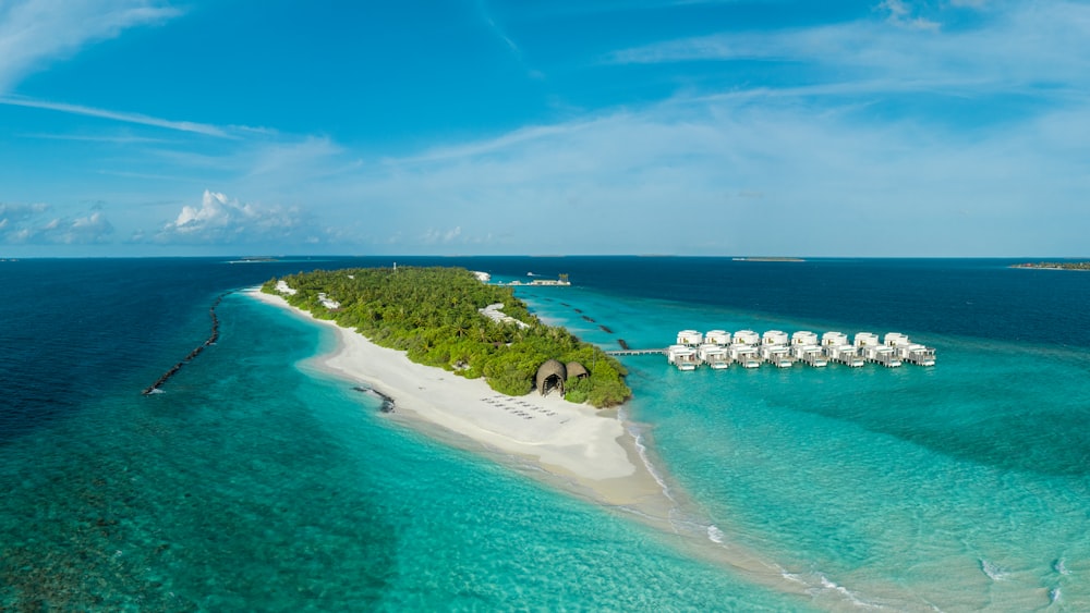 an aerial view of an island in the middle of the ocean