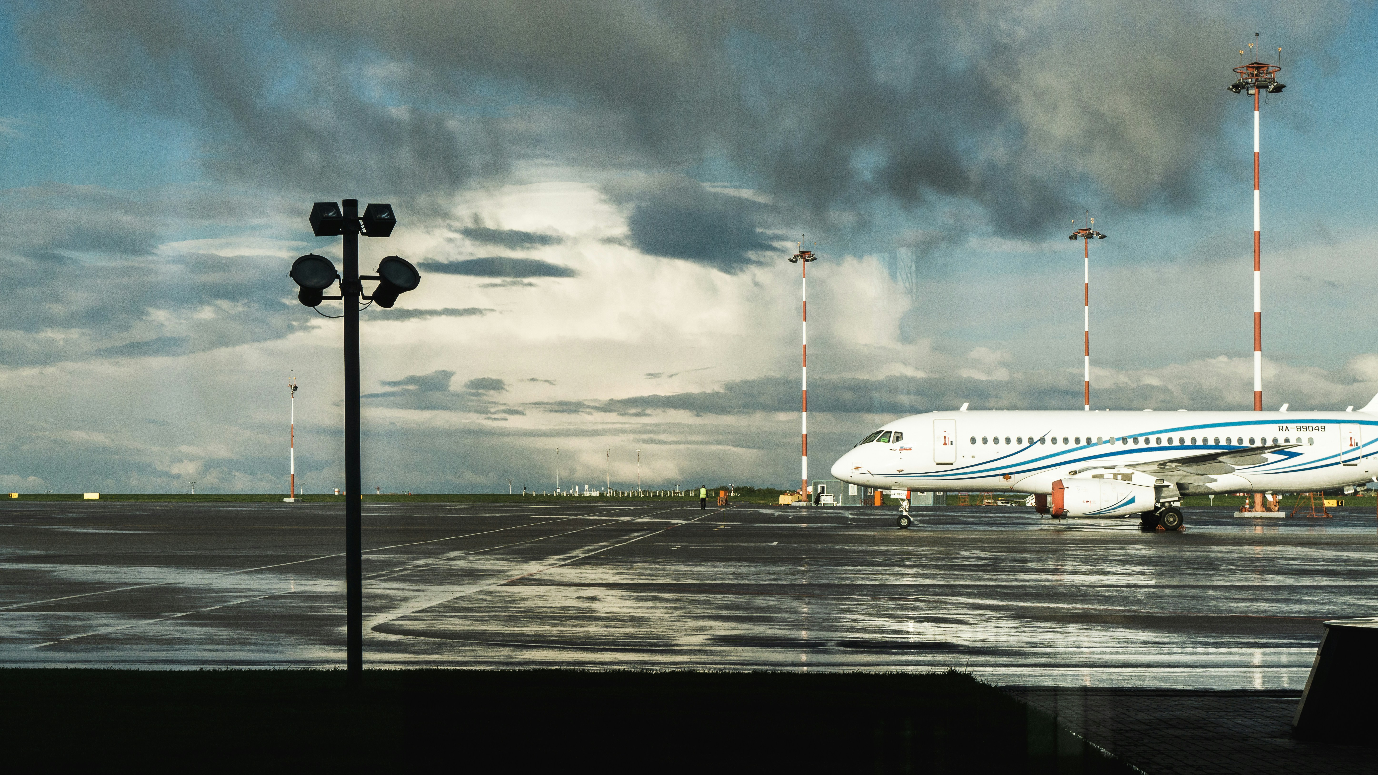 a large jetliner sitting on top of an airport tarmac