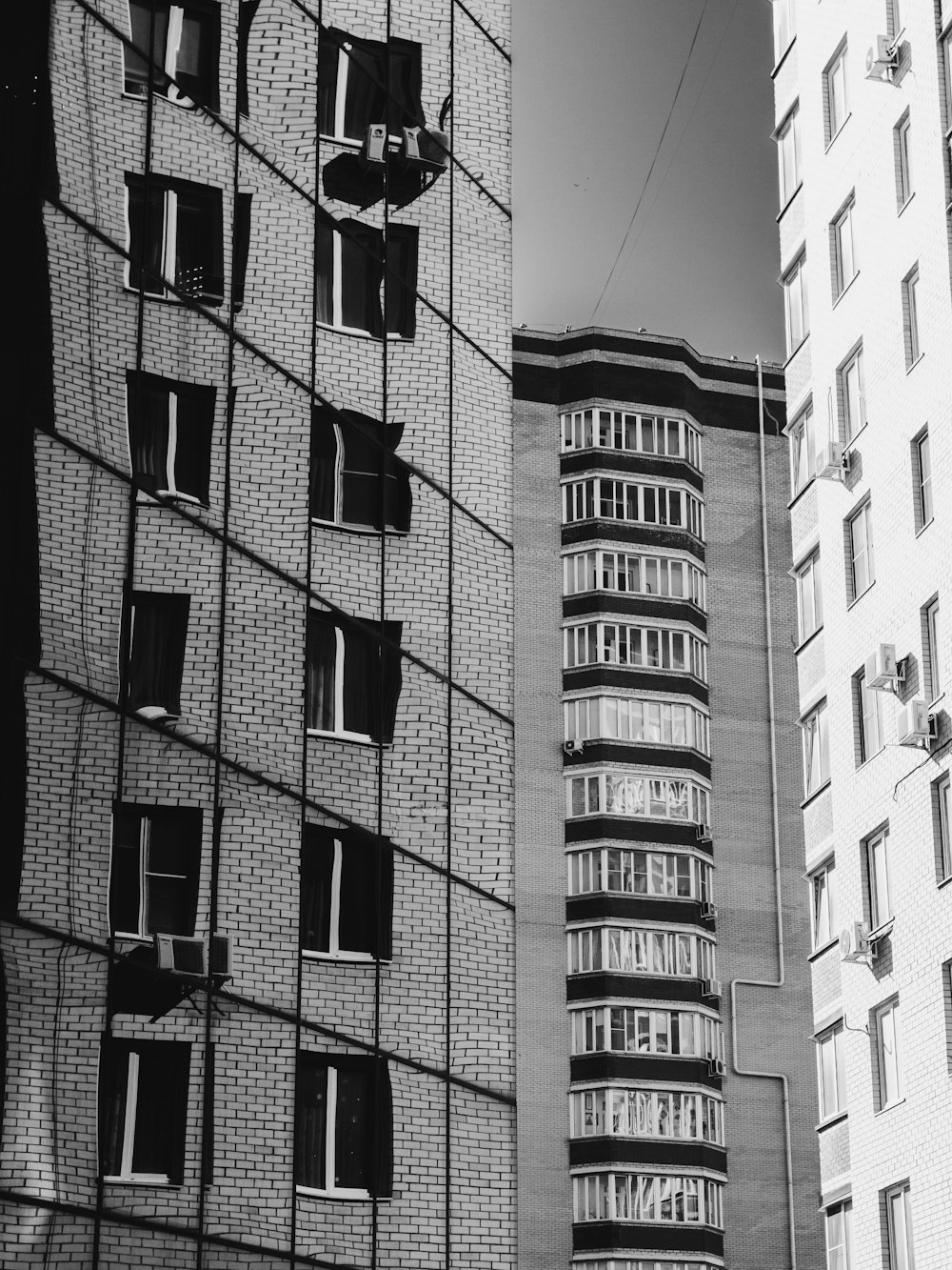 a black and white photo of a tall building