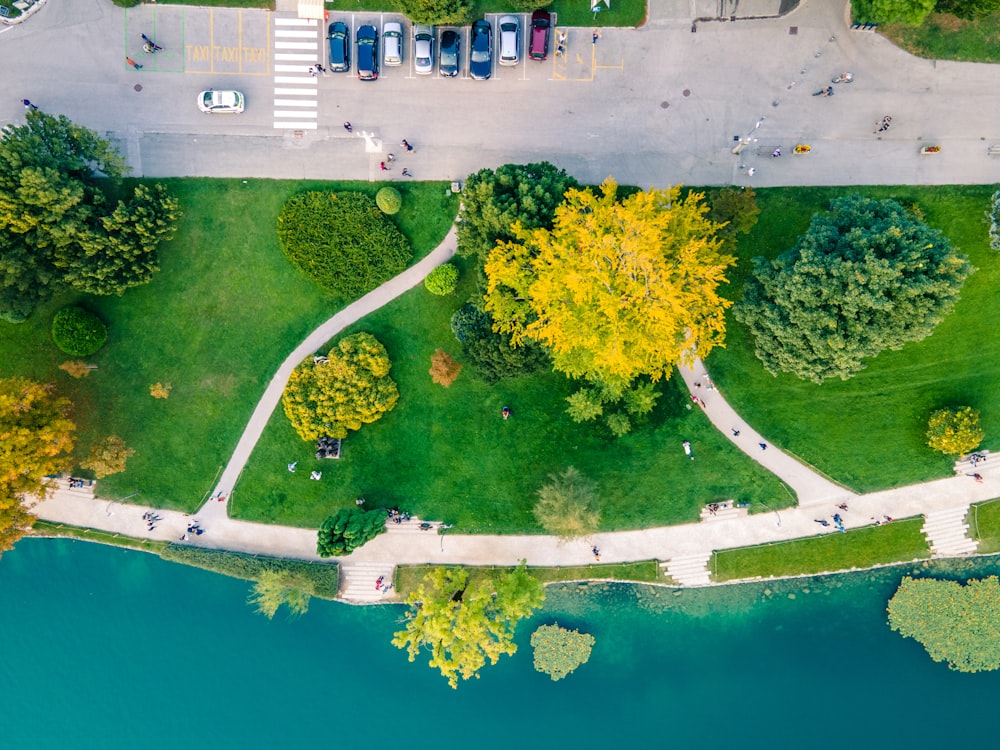 an aerial view of a park and a river