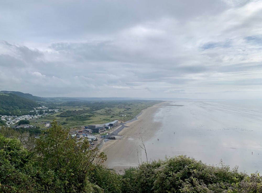 a view of a beach from a hill