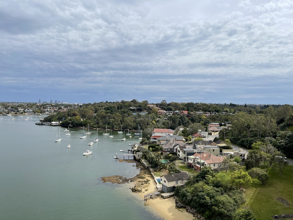 an aerial view of a small town on the water