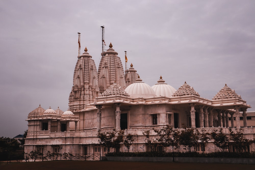 a large white building with many spires on top of it