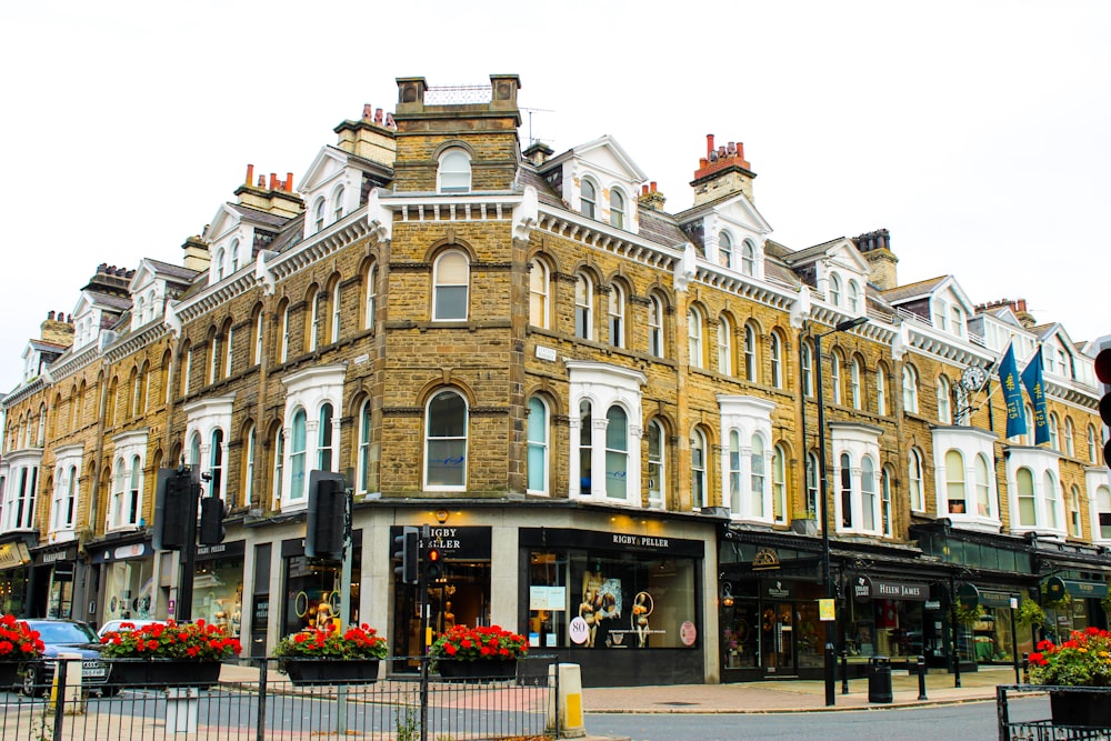 a tall building with many windows on the front of it