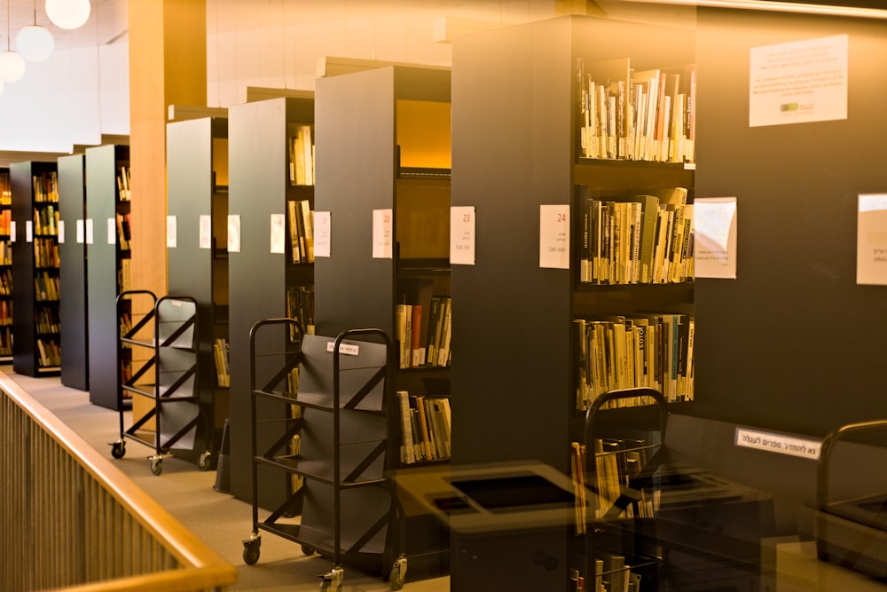 a row of bookshelves filled with lots of books