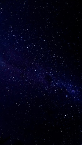 Cosmic nebula with sparkling stars, symbolizing the vast universe of possibilities.