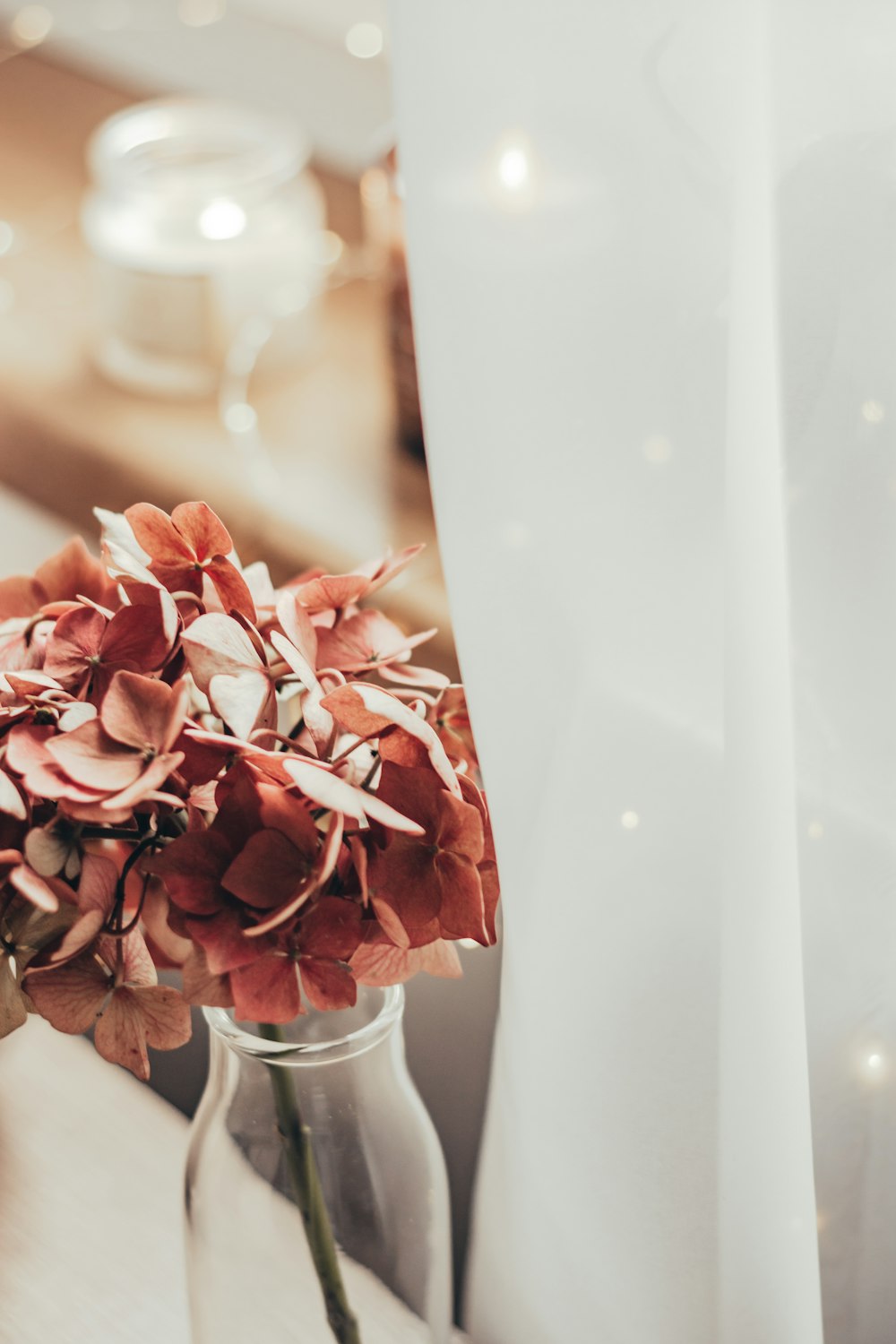 a bouquet of flowers in a vase on a table