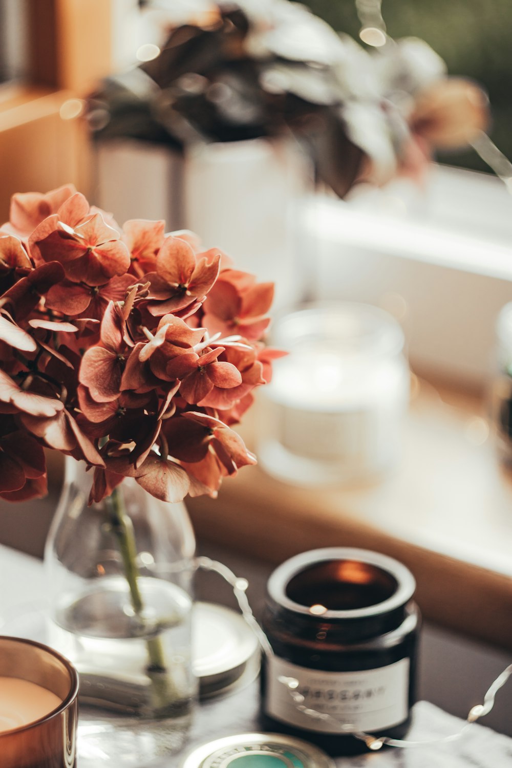 a vase of flowers sitting on top of a table