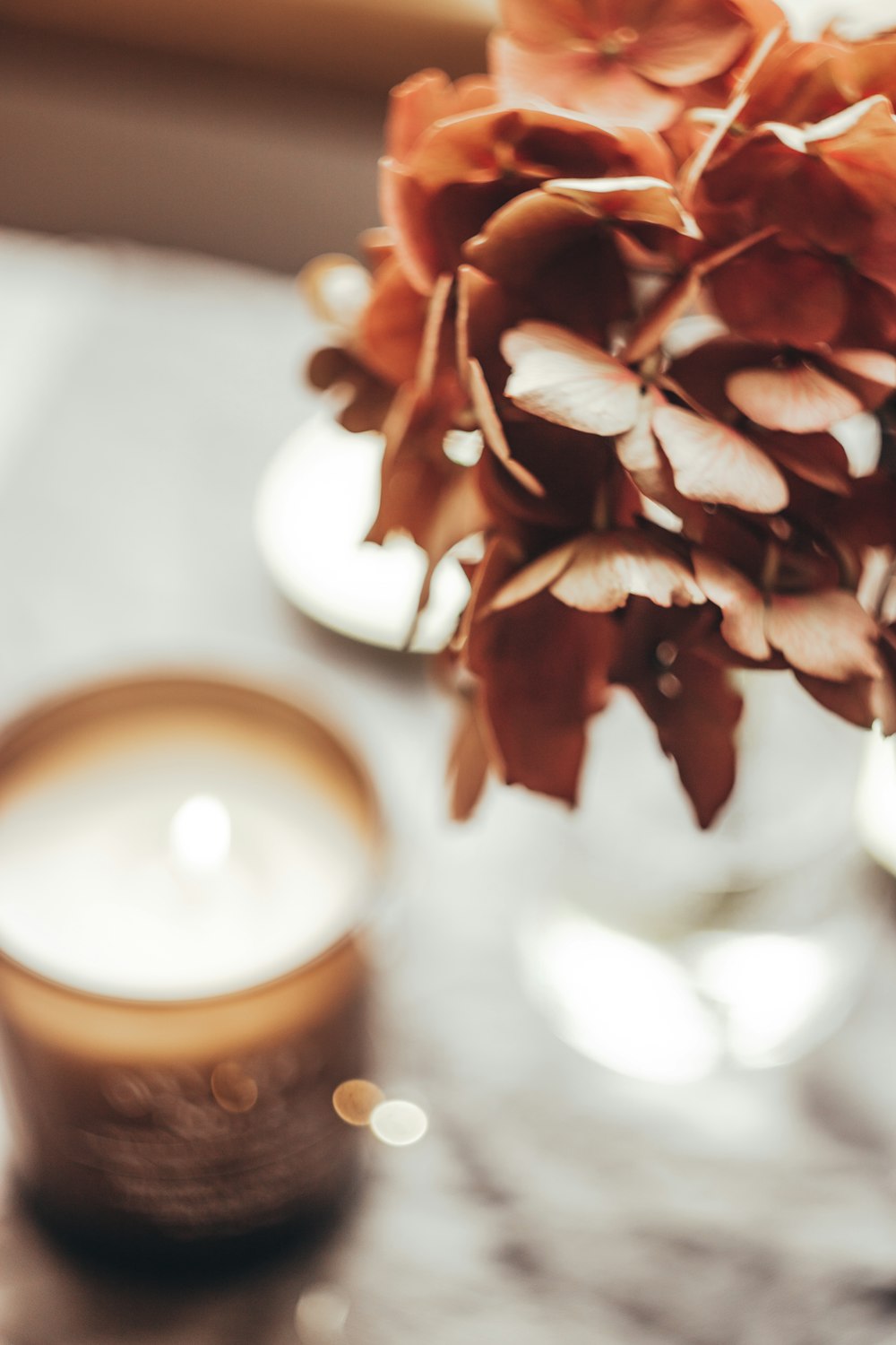 a close up of a candle on a table