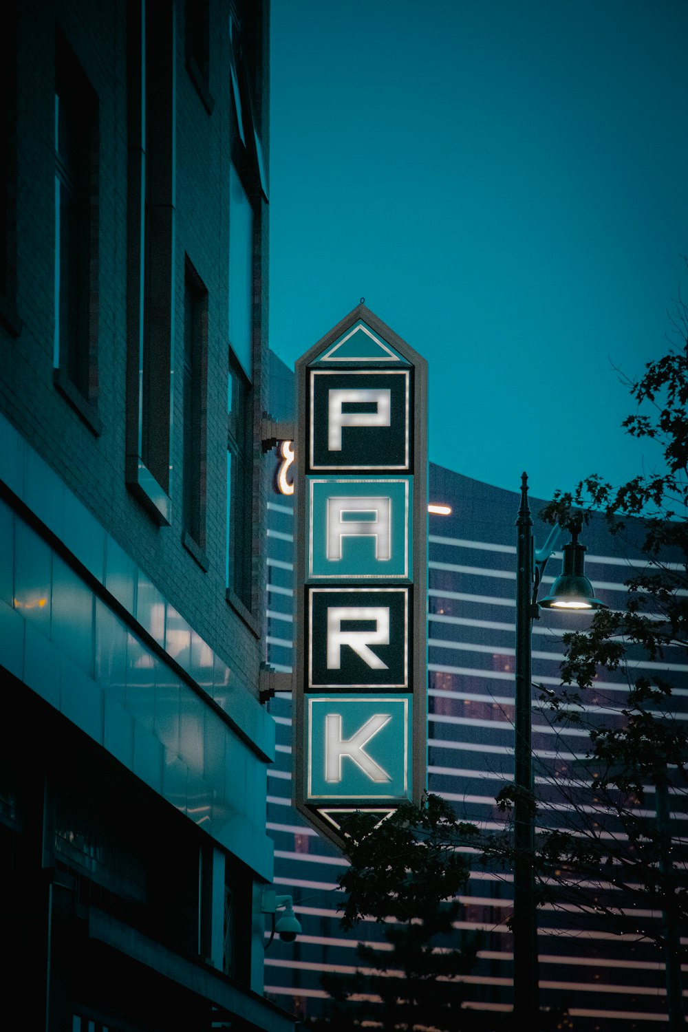 a parking sign on the side of a building