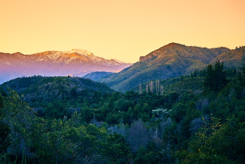 a view of a mountain range at sunset